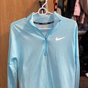 Light blue quarter-zip
